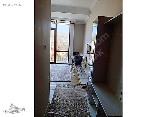 EMİR EMLAKTAN SATILIK ÇARŞI İCİNDE ESYALI APART - KARS MERKEZ fotoğraf 2