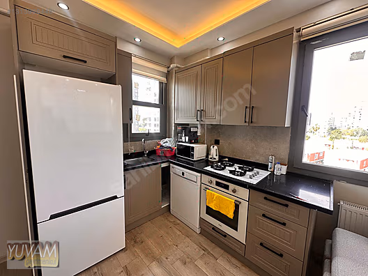 DENİZE 50 METRE MESAFE 1+1 EŞYALI SATILIK DAİRE - MERSİN MEZİTLİ fotoğraf 3