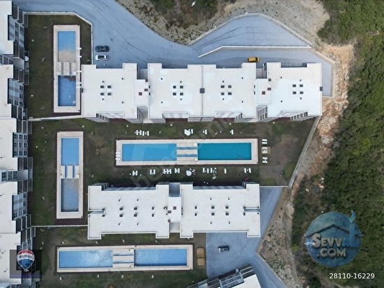 KIRAZLI EŞIN VADI SITESI’NDE SATILIK HAVUZLU 1+1 DAIRE - AYDIN KUŞADASI fotoğraf 5